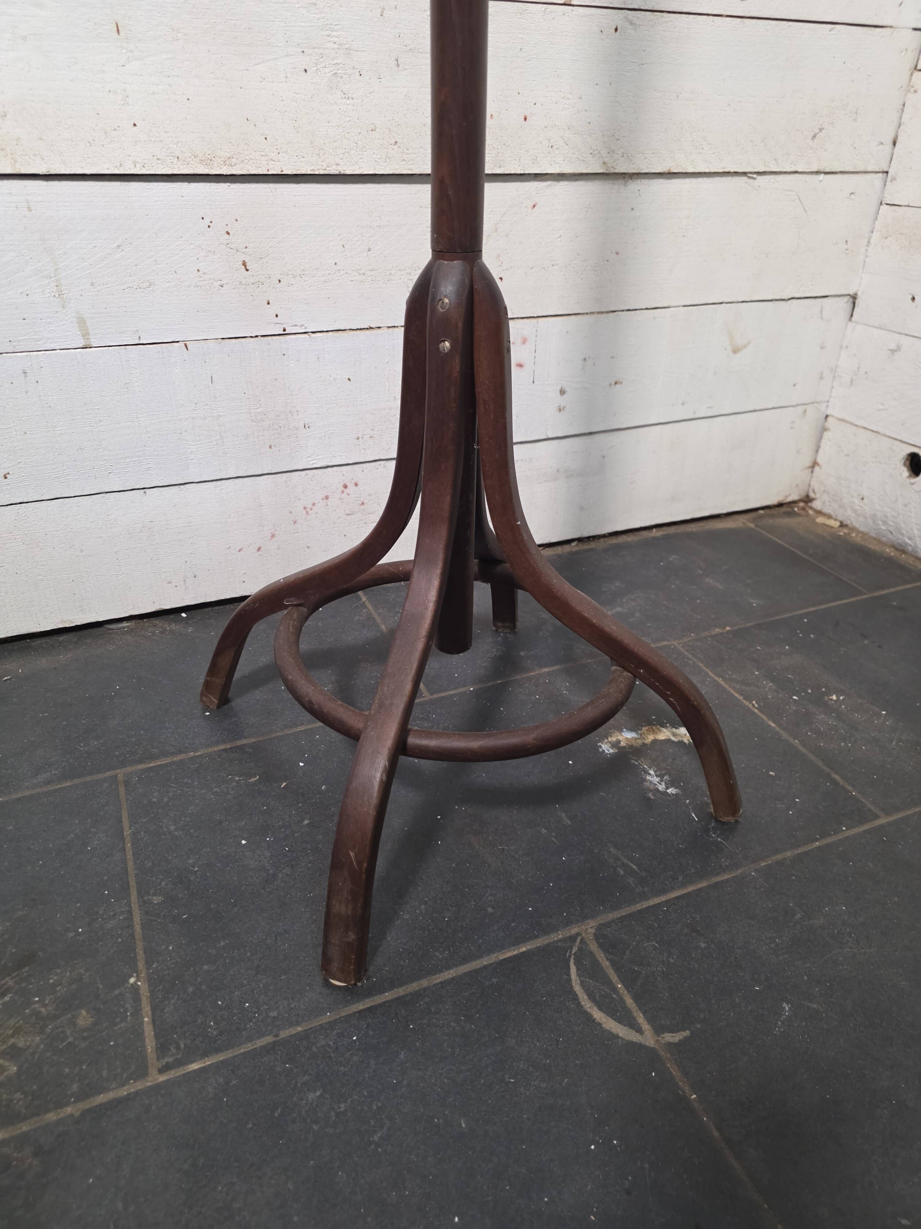 Curved antique wooden parrot