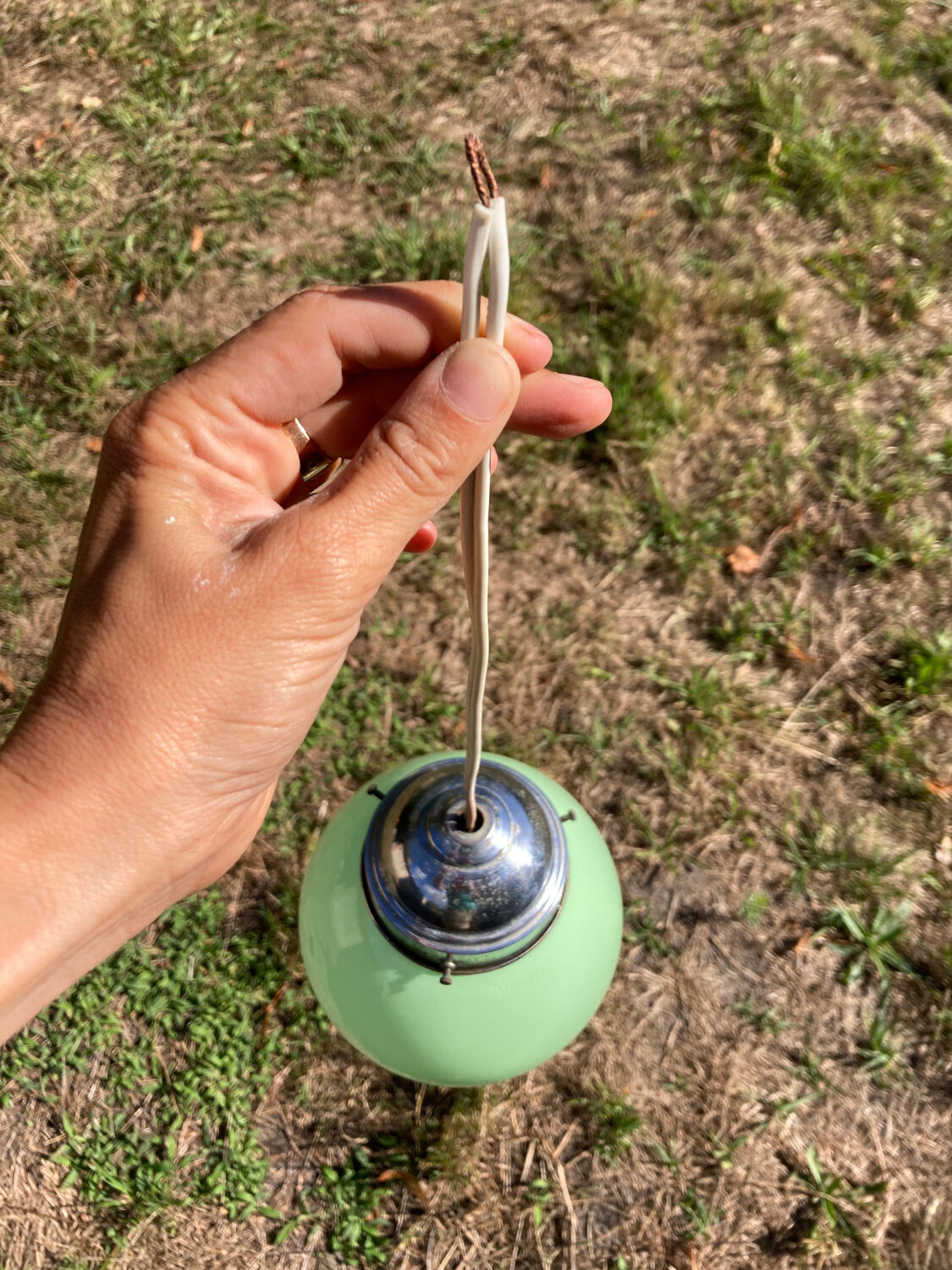Suspension ball in art deco green glass 1930