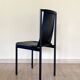 4 postmodern design chairs in black metal and leather, 1980's