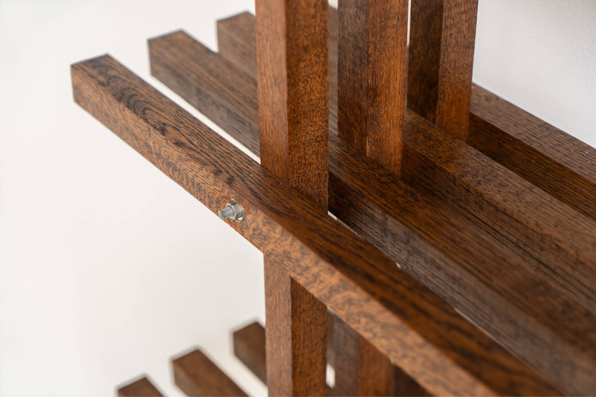 Sculptural wengé slat bookcase (Europe, 1960s).
