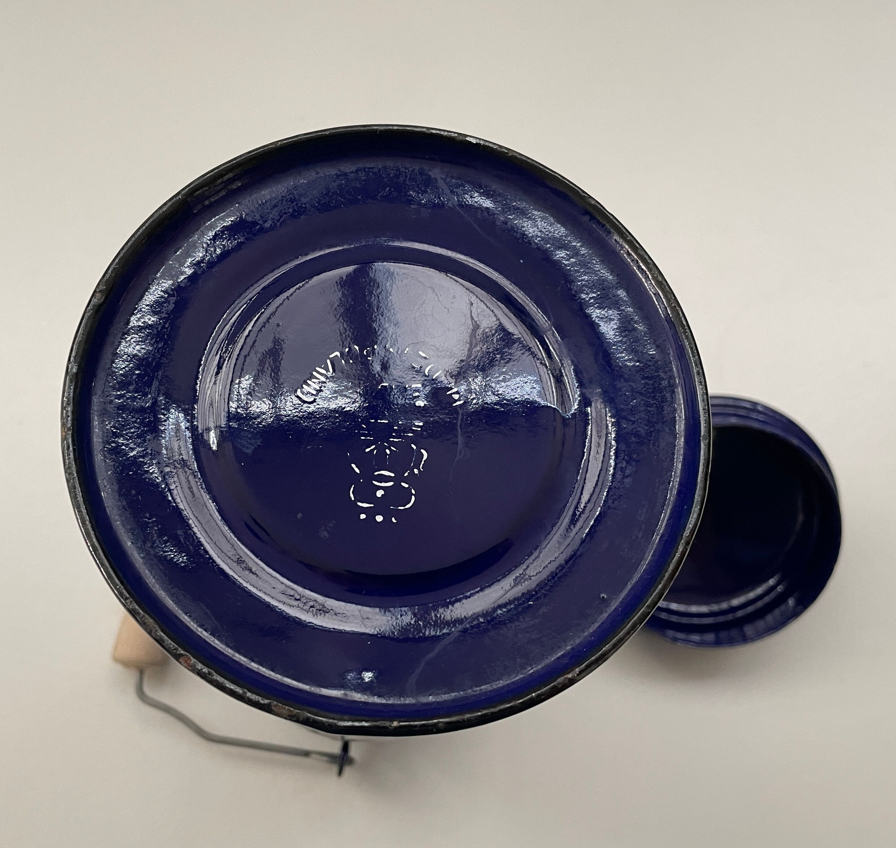 Blue enamelled milk jug