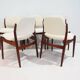Set of six hardwood chairs by Arne Vodder for Sibast with white textile upholstery.