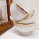 Trio de bols en porcelaine blanc et or