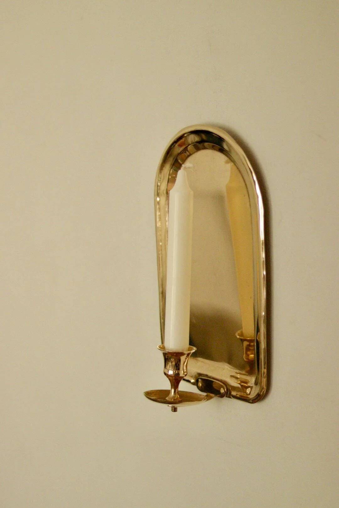 Single mid-century Swedish brass sconce