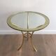 Pair of round gold side tables