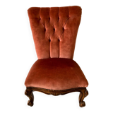 Petit fauteuil capitonné