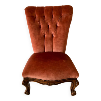 Petit fauteuil capitonné
