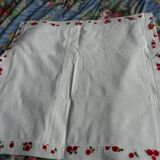 pair of monogrammed RB embroidered pillowcases in pink and red