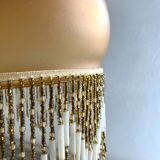 Amber polished glass and pearl suspension