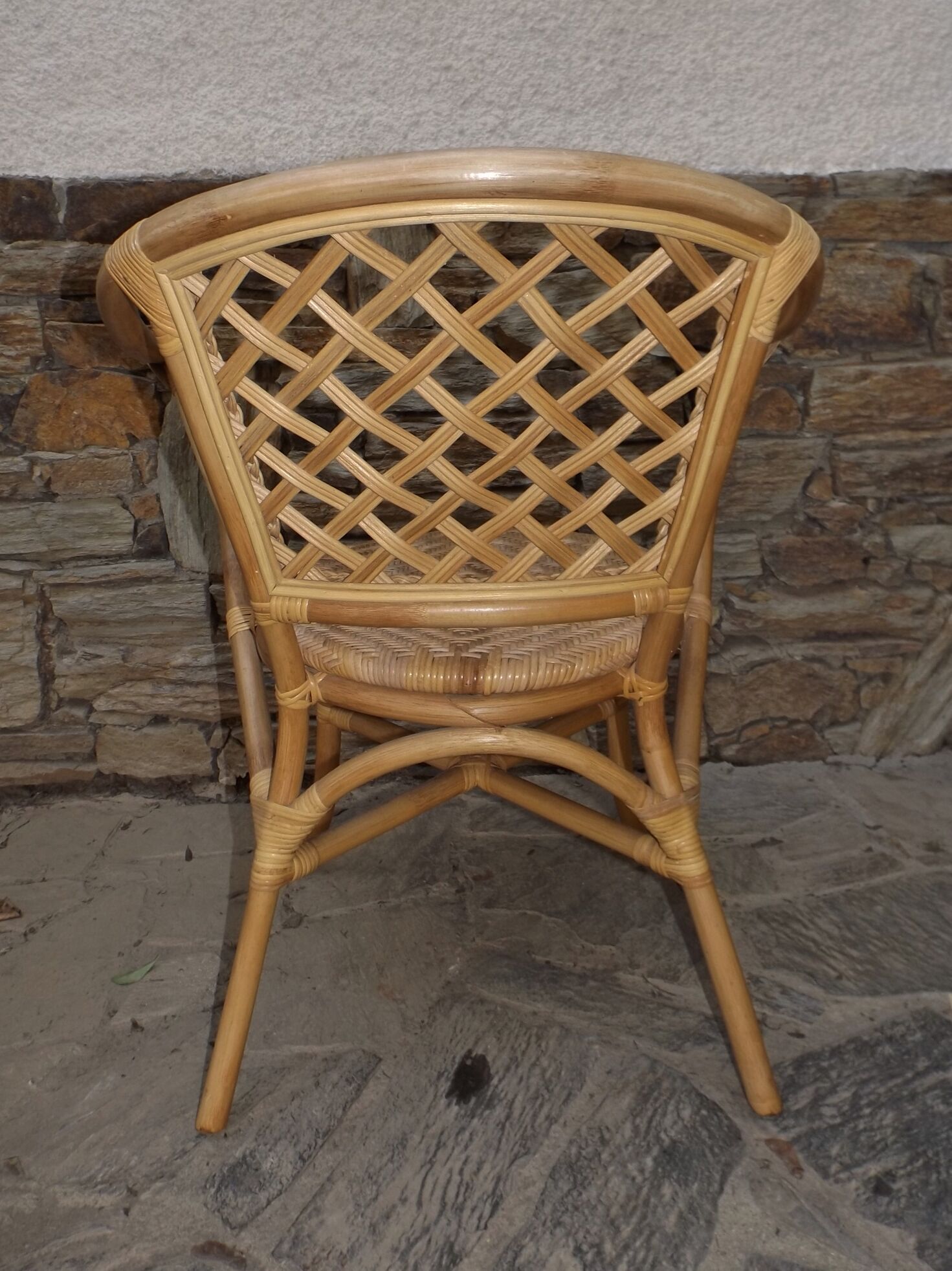 Armchair in rattan in Assisi year circa 1970