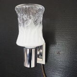 Torch type wall lamp in transparent and white glass