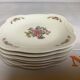 Six small Raynaud Limoges flower plates