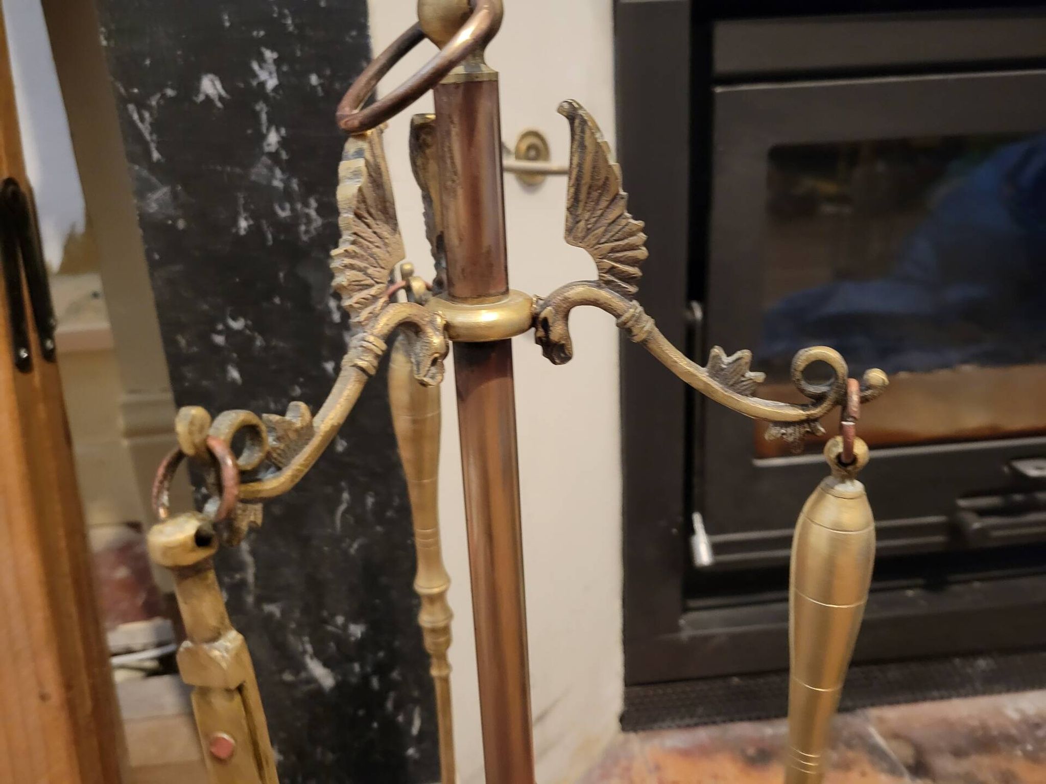 Fireplace tool set in gilded bronze