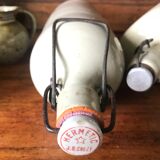 Bottles in varnished sandstone