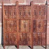 Carved solid wood screen.