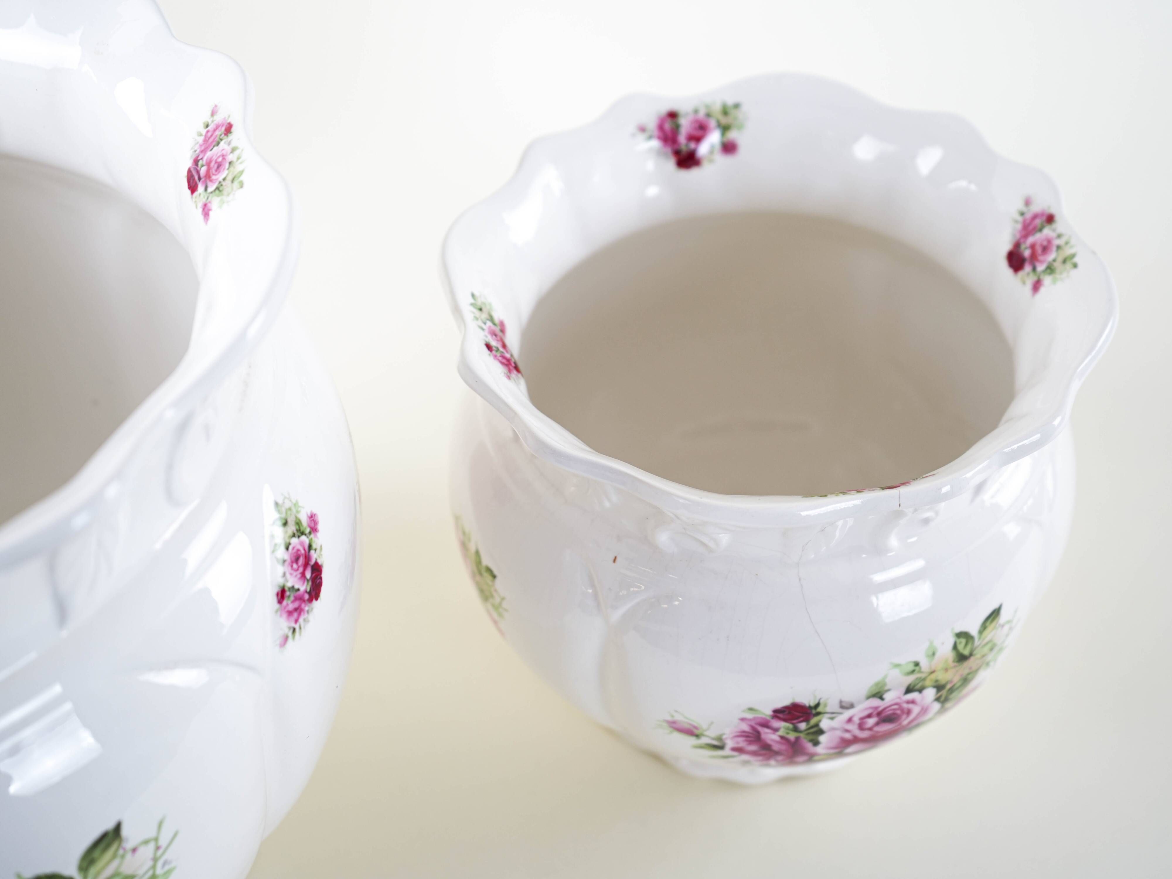Pair of decorative ceramic vases with hand-painted roses, Art Deco style, European