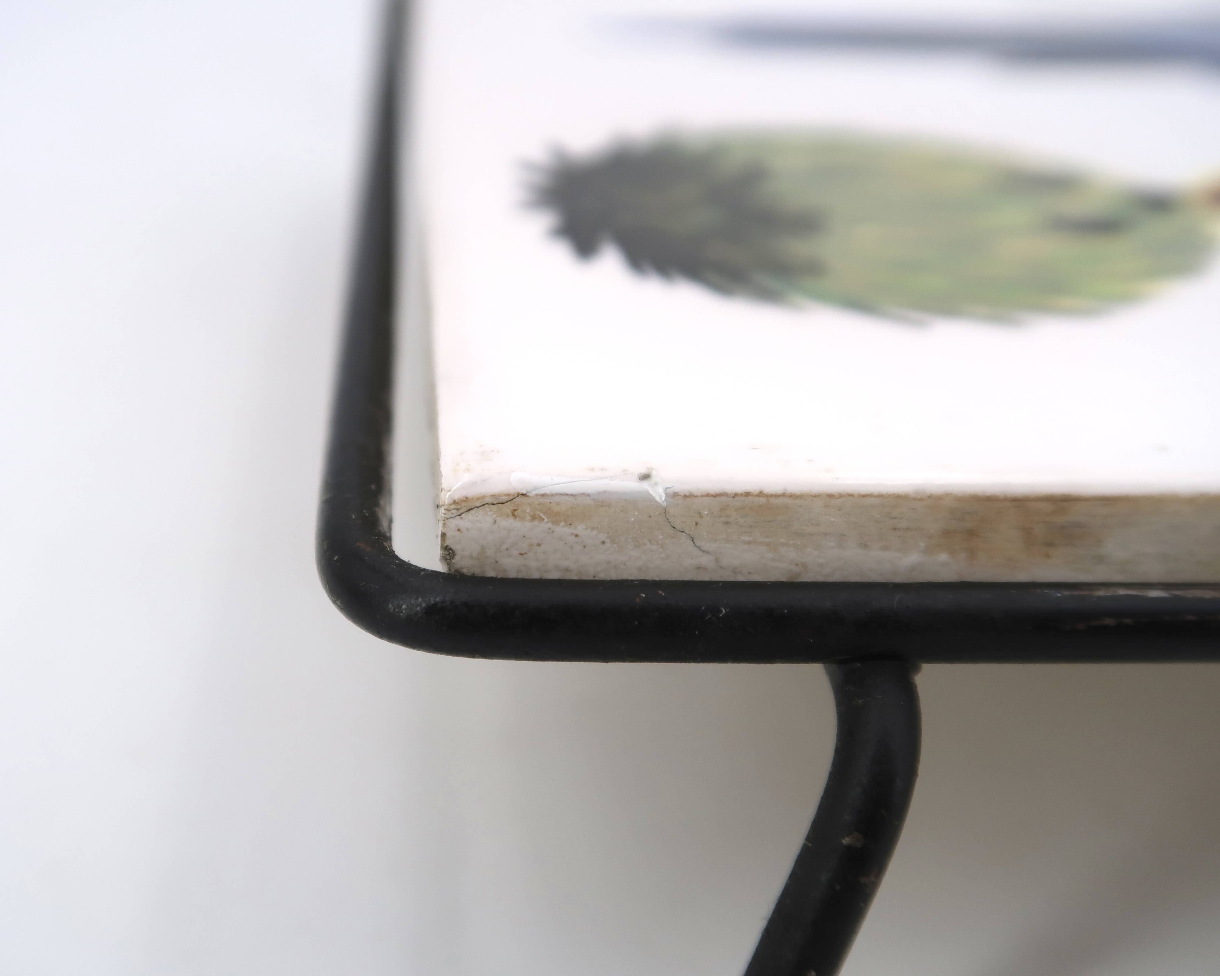Square ceramic trivet with a bird by Jean Pierre Caffarelli.