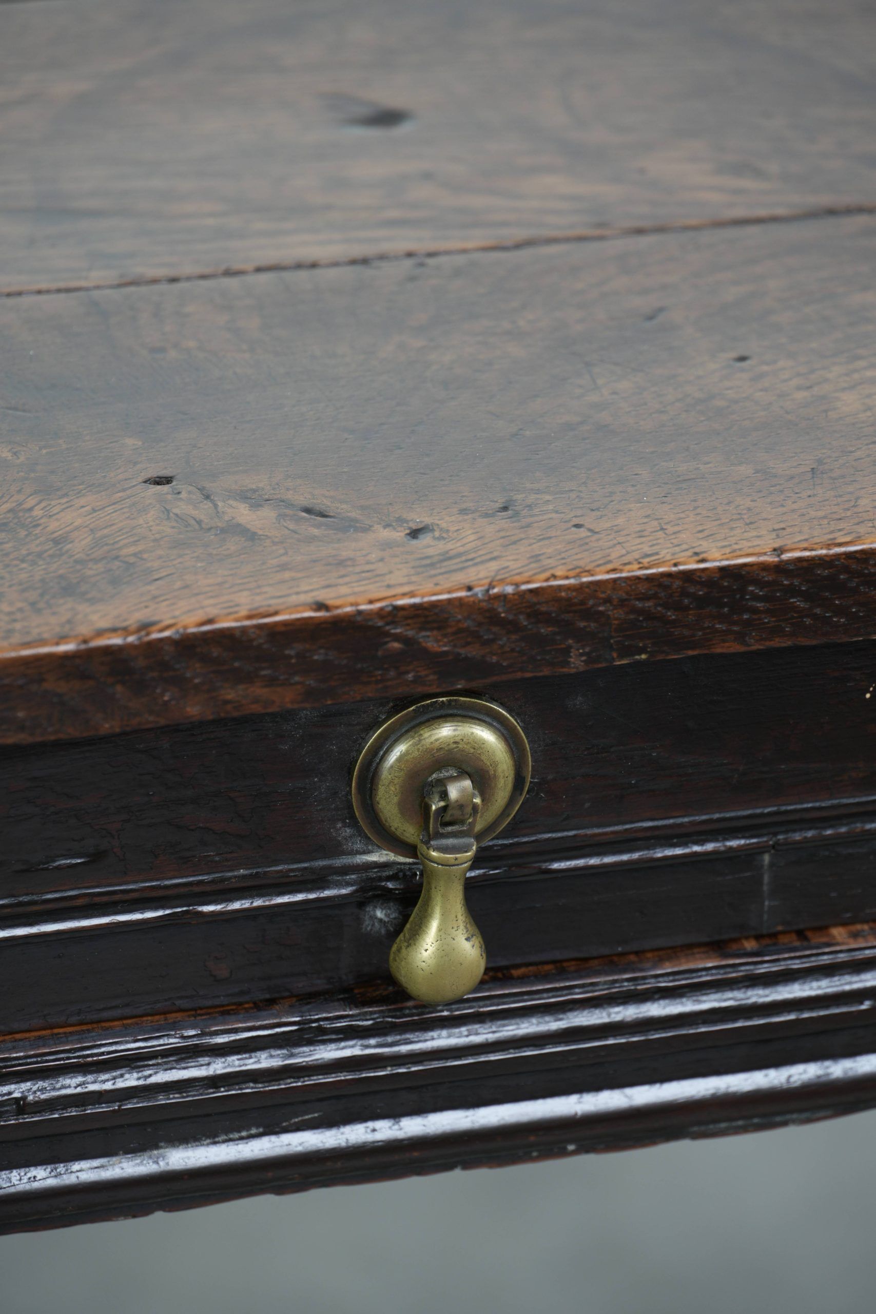Antique English oak side table from the 18th century with bobbin legs