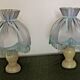 Pair of marble bedside lamps with blue satin fringed shades