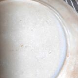 Antique earthenware plates with fruit decoration.