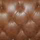 Chesterfield Regency 1810 antique canapé restored in leather with a carved frame.