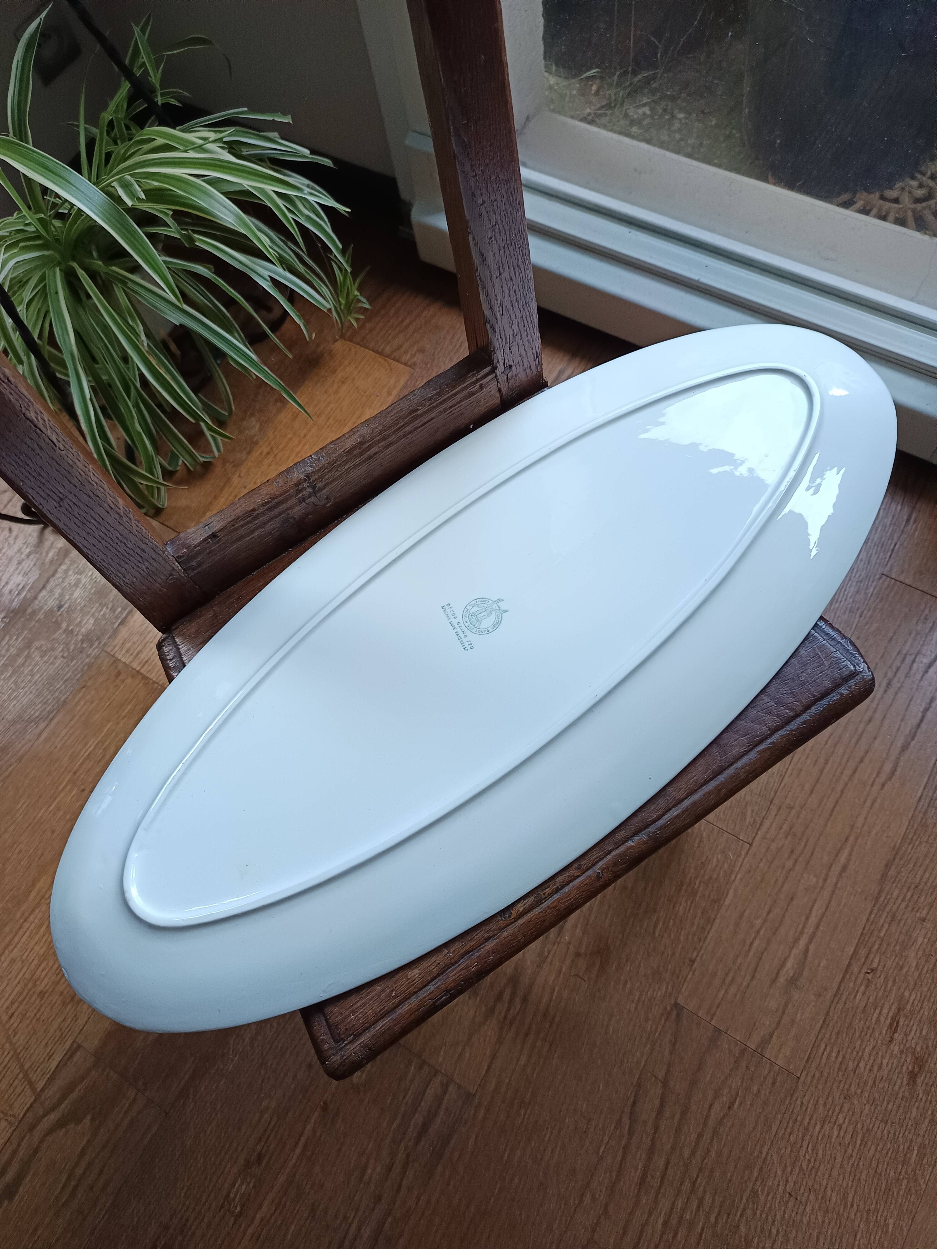 Large ceramic dish in the shape of a fish, Moulin des Loups brand