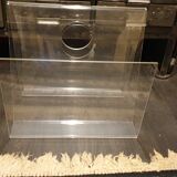Transparent plexiglass magazine holders age space