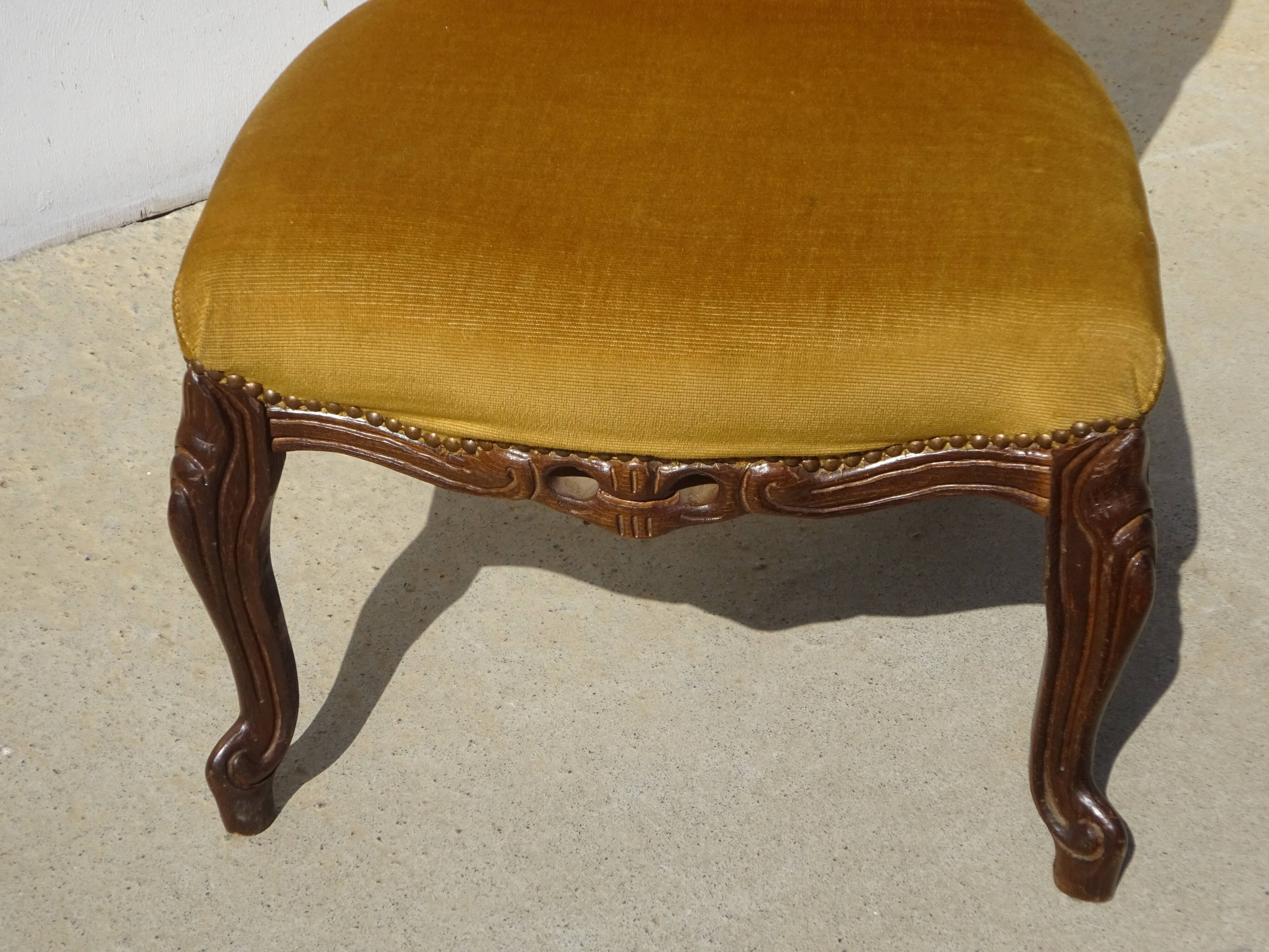 Golden yellow velvet armchairs