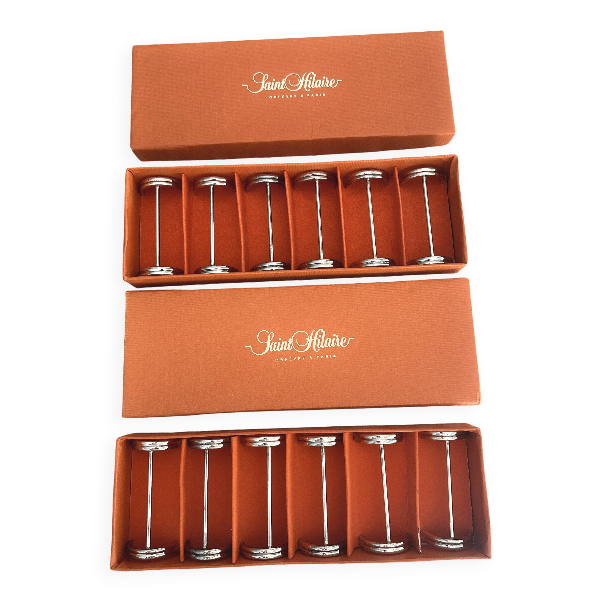 12 porte-couteaux en métal argenté Saint Hilaire modèle Arceaux en coffret