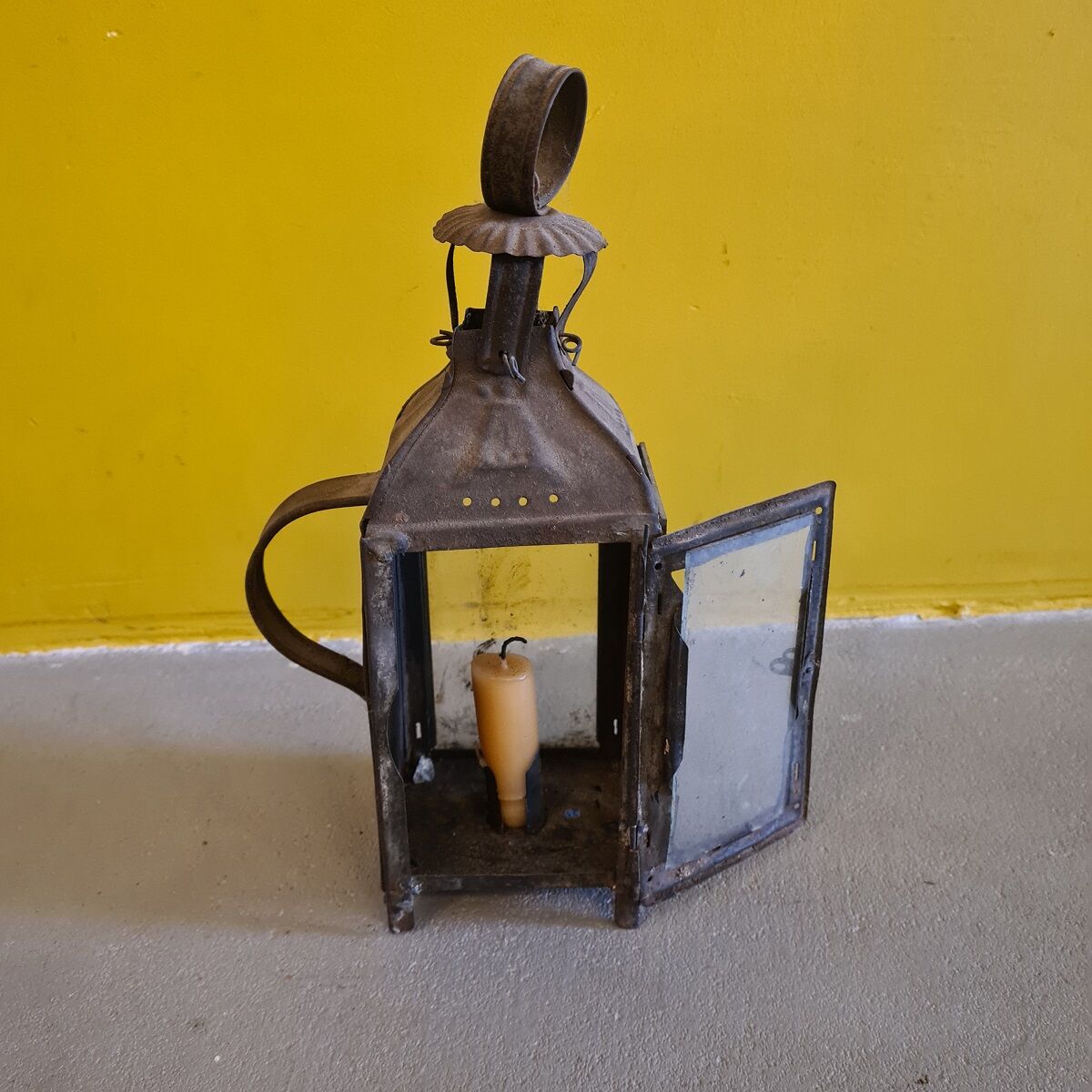 Antique french metal walking candle lantern. from around 1900.