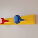 Pencil wall coat rack