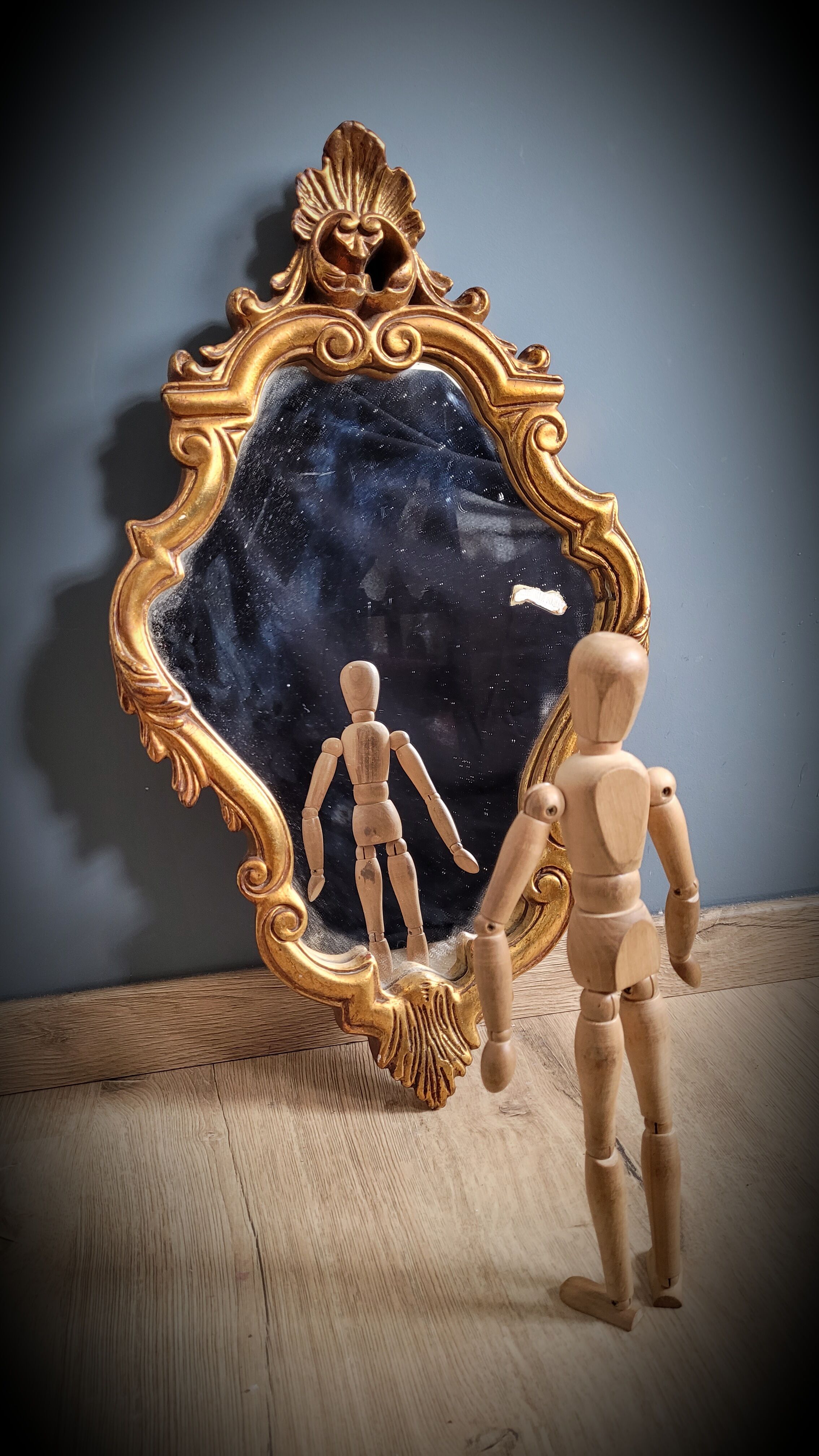 Gilded mirror worked 33x58cm