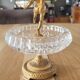 Footed catch-all / ashtray with cherub (glass and gilded metal)