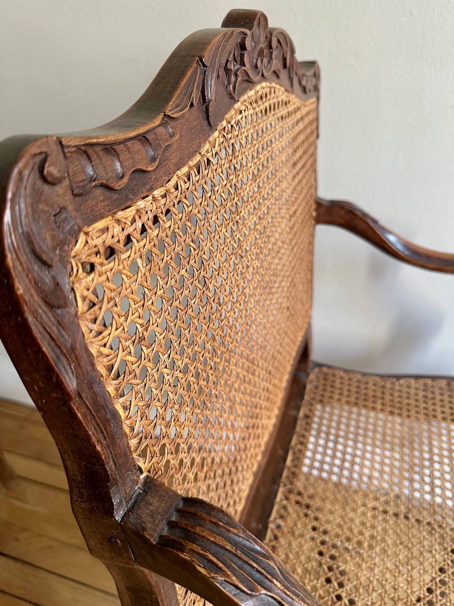 A pair of Regency armchairs with a stretcher.