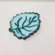 Enamelled ceramic leaf-shaped pocket emptier Signed ACCOLAY