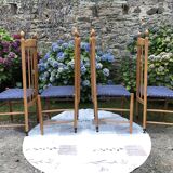 4 vintage Roche Bobois chairs from the 80s in beech with woven seats in blue fabric.