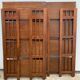 Pair of folding wooden bookcases, 4 shelves, 1950