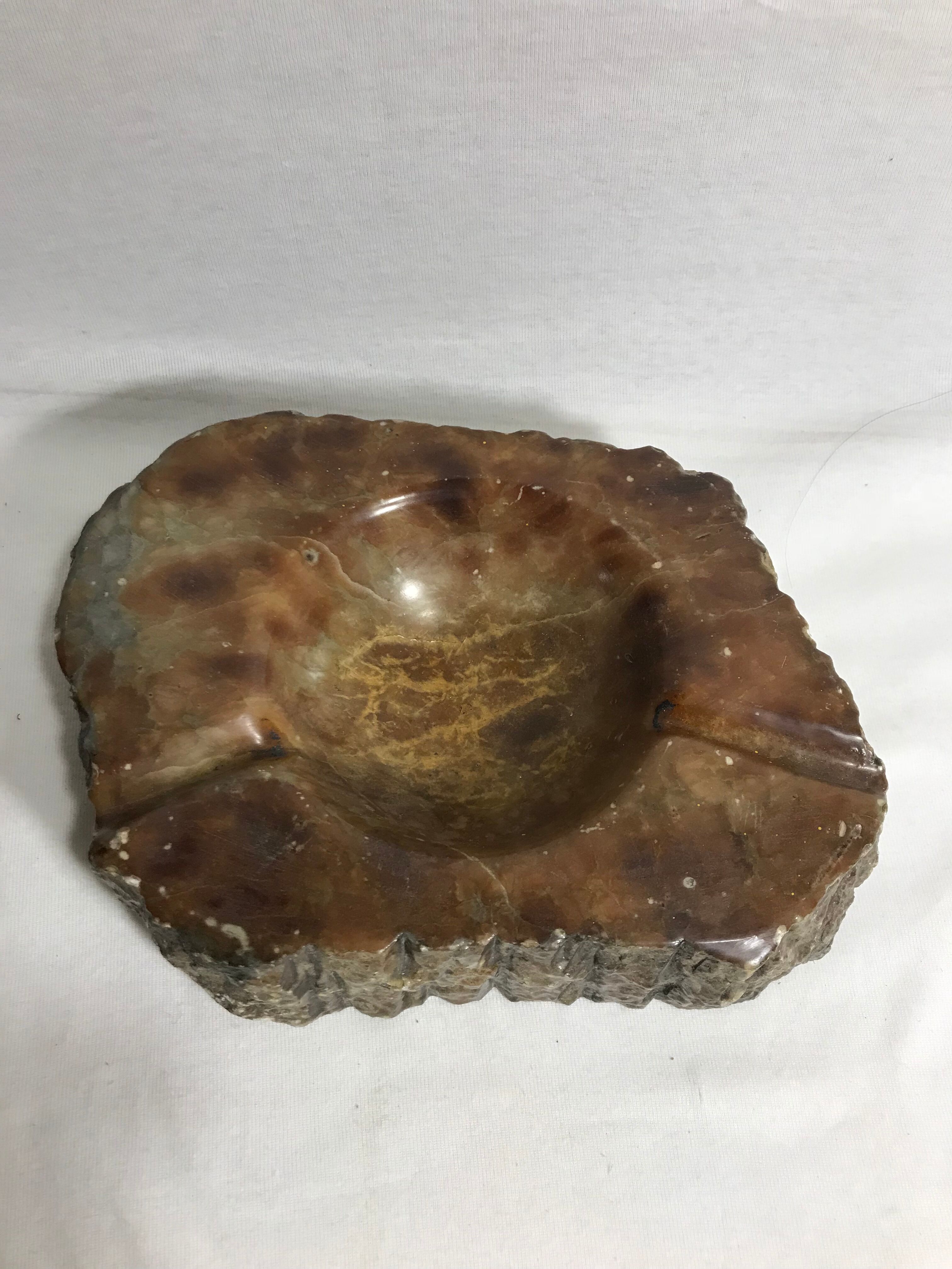 Ashtray old polished stone