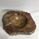Ashtray old polished stone