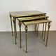 Nested brass tables, attributed to Maison Baguès, France, 1950–60.