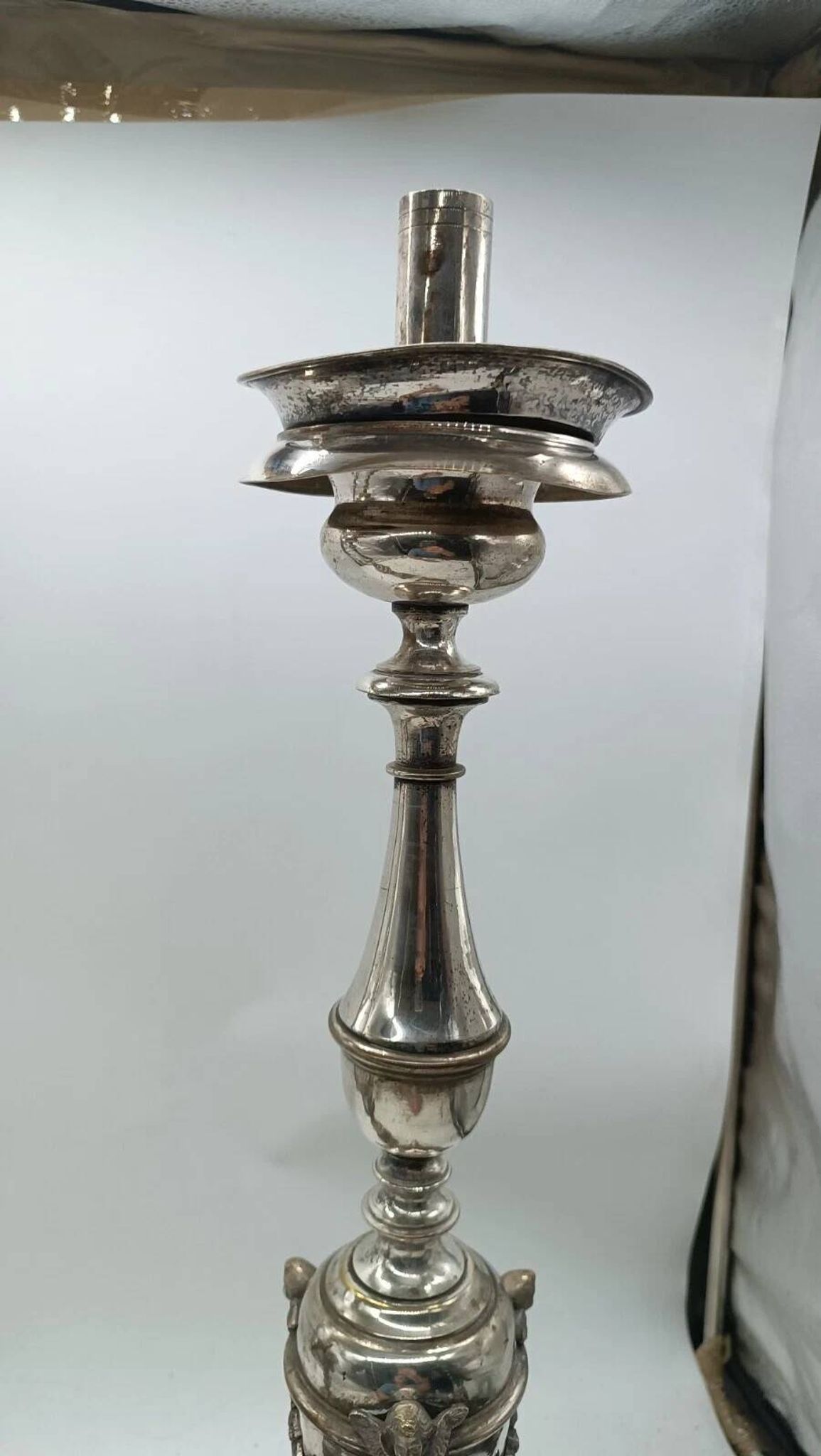 Pair of silver-plated bronze candlesticks in the Empire style, early 19th century, height 70 cm