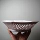 Pale pink woven octagonal porcelain bowl, circa 1950.