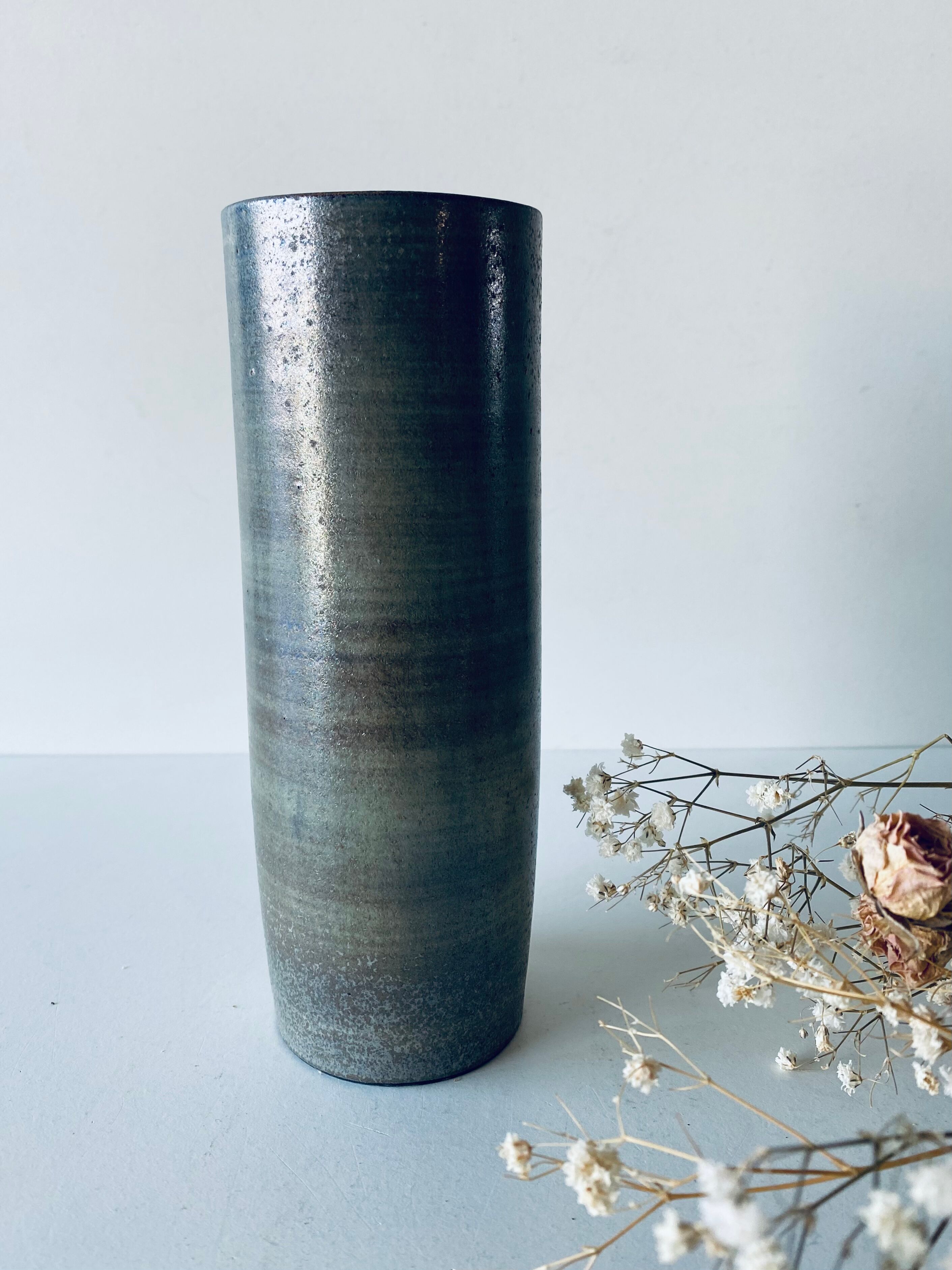 Signed ceramic tubular vase