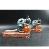 Antique Art Deco bookends in silver-plated metal, bakelite, and marble, signed H. M.