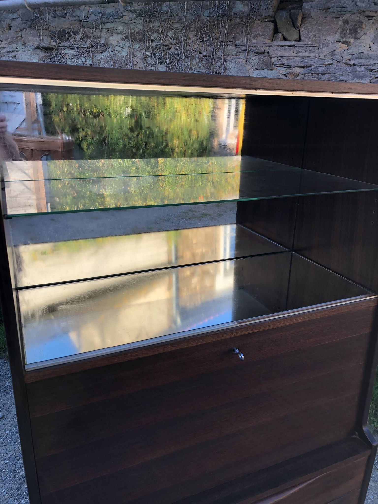 Vintage Scandinavian secretary in rosewood with drawers featuring fin-style handles.