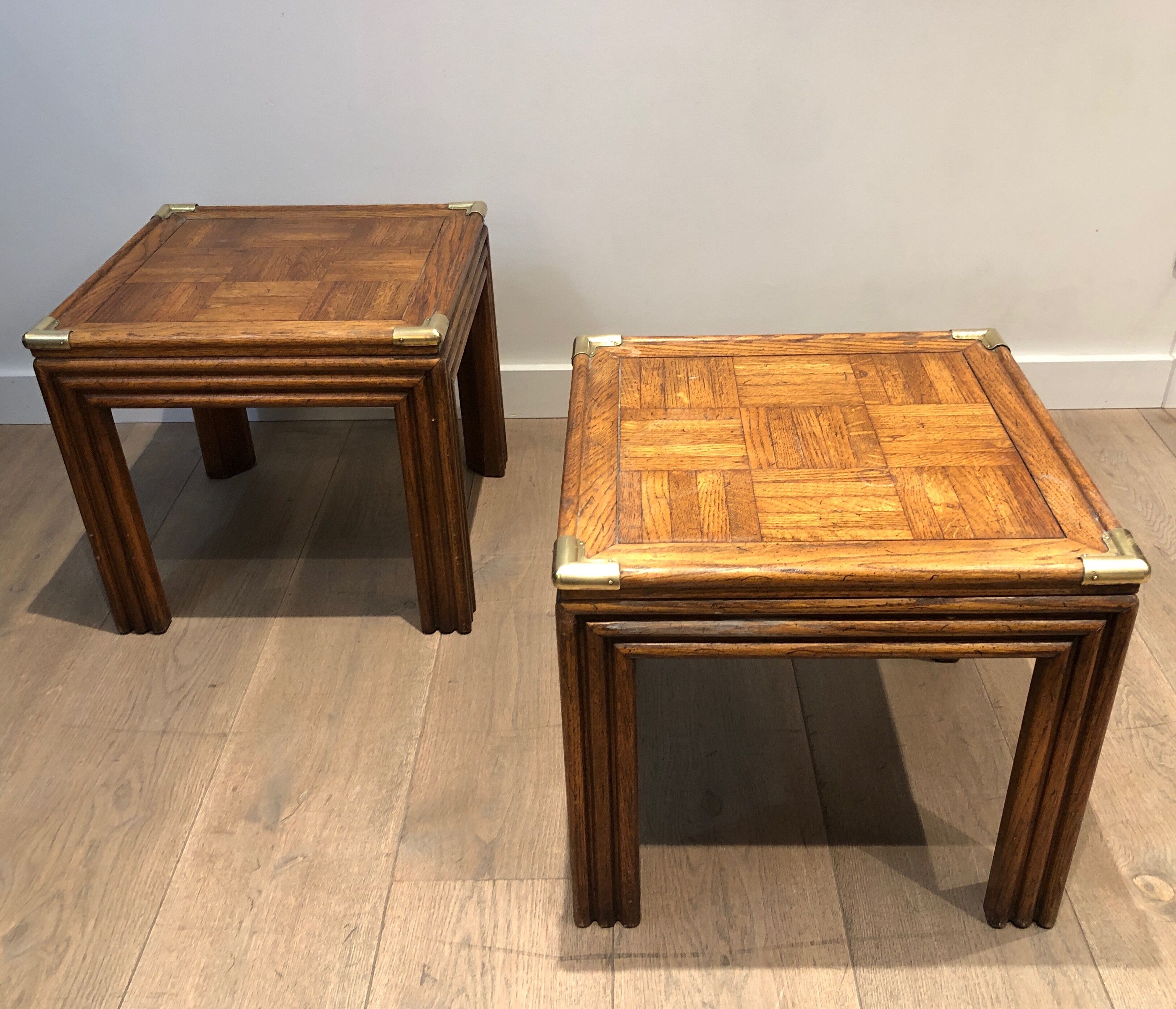 Pair of wooden and brass sofa ends