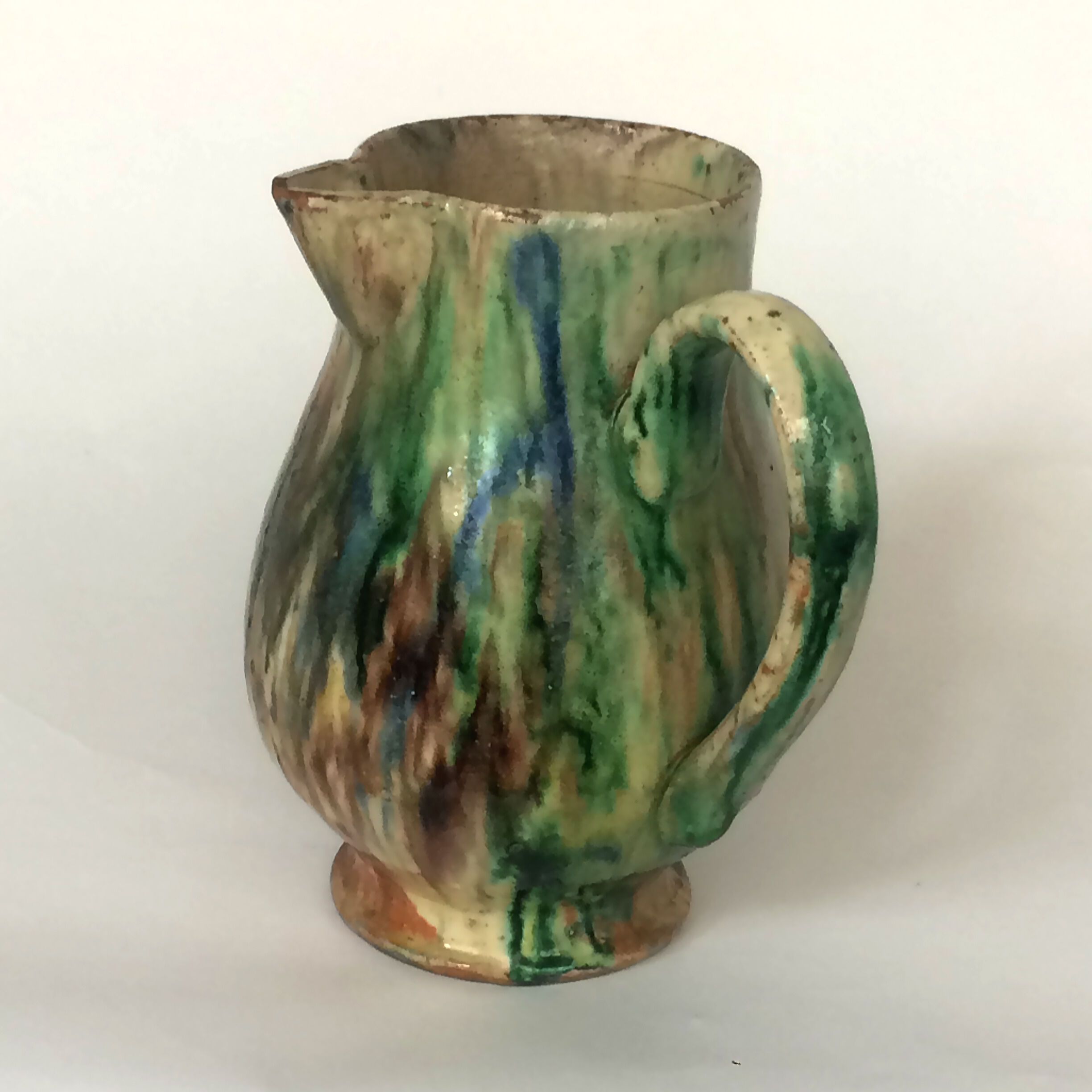 Glazed earth jug