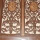 Pair of cast iron door grilles with its coat