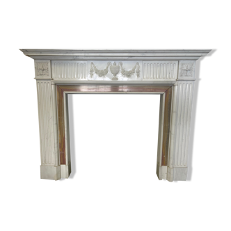 Louis XVI style mantel in white Carrara marble.