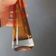 Two vintage Scandinavian double-layered amber blown glass candlesticks